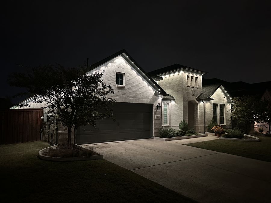 Clean warm white roofline on brick