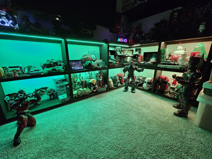 Display shelving lit with green programmable LED lighting