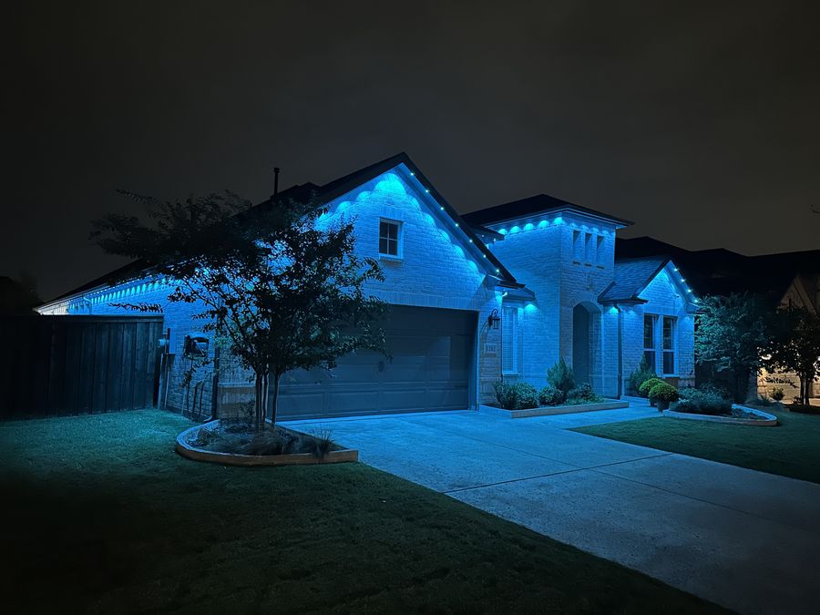 The same brick home in blue